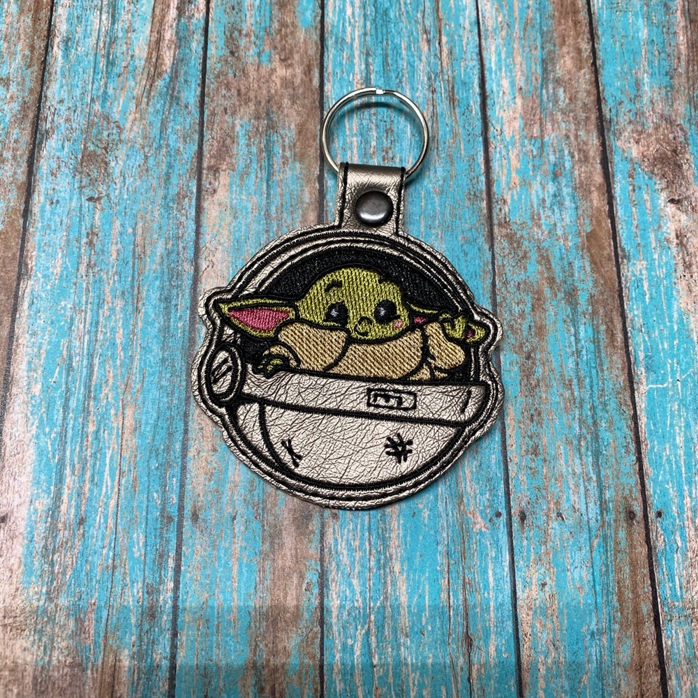 Space traveler keychain/bag tag